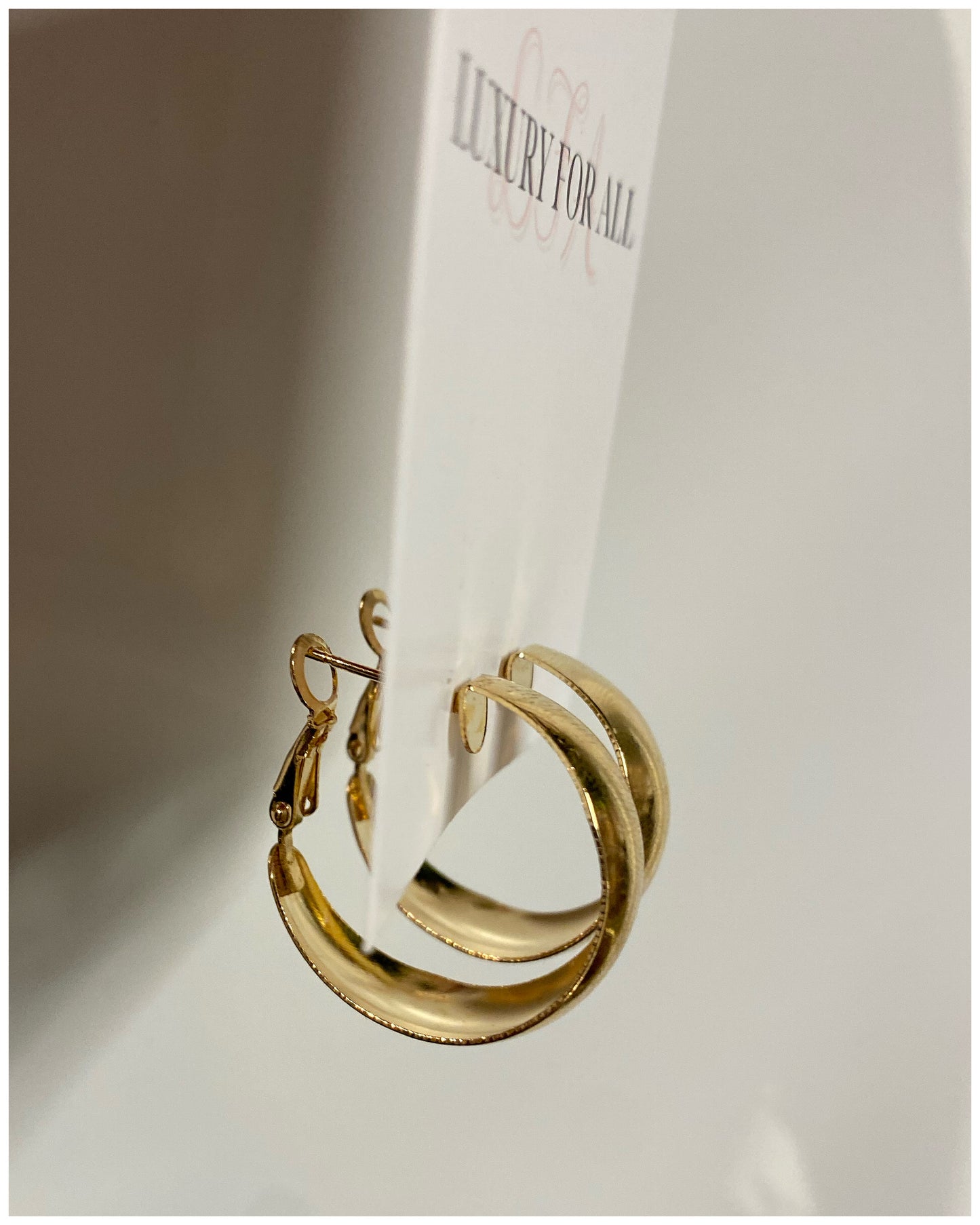Belle oorbellen goud rond
